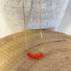 collier en acier inoxydable et perles de verre rouge