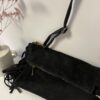 sac en cuir noir et franges