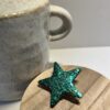 broche étoile verte grand format