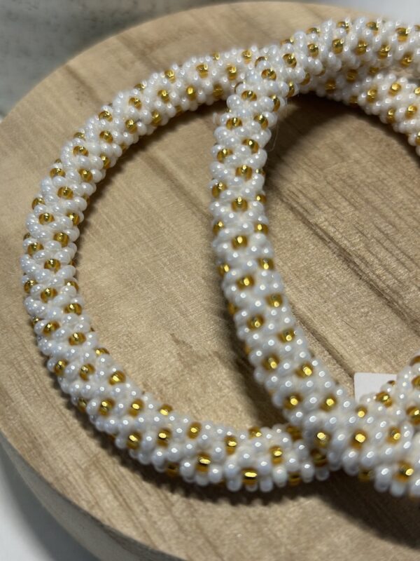bracelet blanc et doré